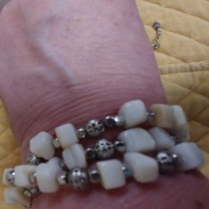 Three elasticated bracelets white beads & silver
